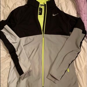 NWOT Women’s Nike Reflective Windbreaker